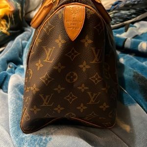 Authentic Louis Vuitton large speedy bag. Purchased from the real real